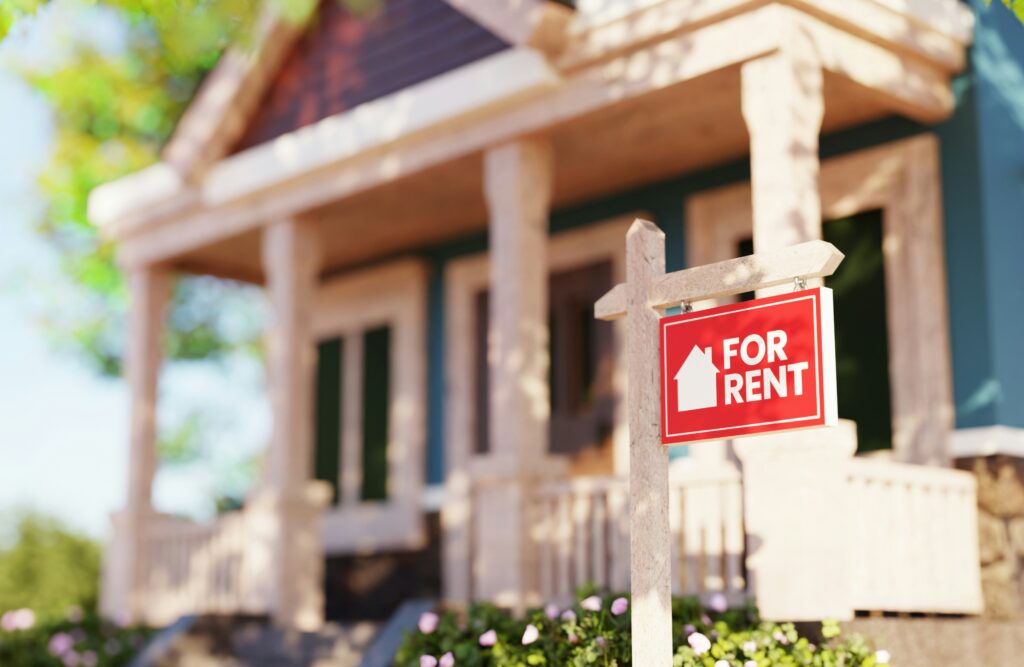 Grand rapids rental property with a "for rent" sign.